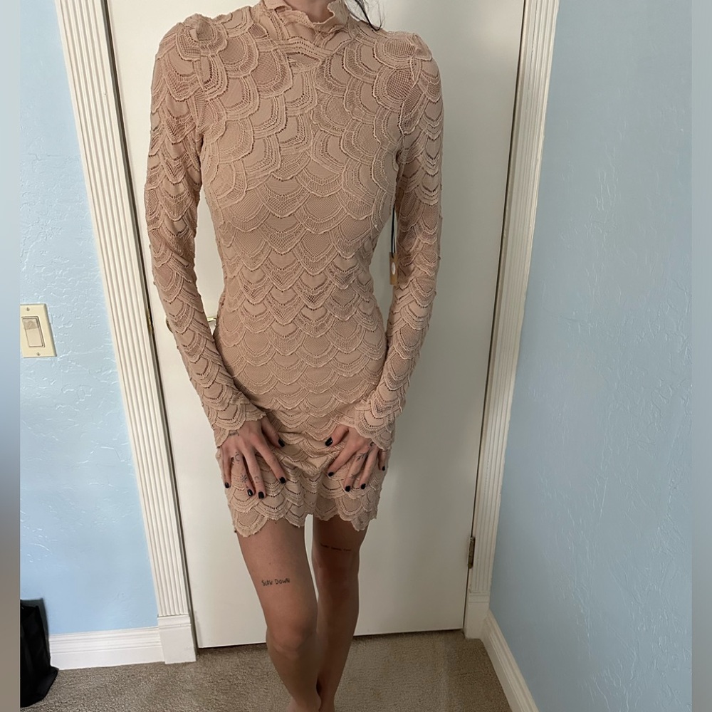 NWT bought from Free People size 3 ( small to medium) lace dress